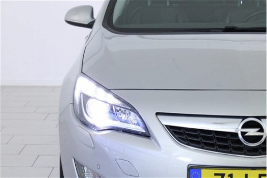 Opel Astra - 1.4 Turbo Cosmo 140PK | LEER | NAVI | COMFORTZETELS | TREKHAAK AFN. | ZEER LUXE | DEALE - 1