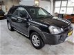 Hyundai Tucson - 2.0i CVVT DynamicVersion 2WD - 1 - Thumbnail