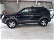 Hyundai Tucson - 2.0i CVVT DynamicVersion 2WD - 1 - Thumbnail