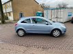 Opel Corsa - 1.4-16V Enjoy AUTOMAAT / 60.000 NAP / Airco / Tweede eigenaar - 1 - Thumbnail