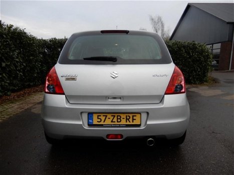 Suzuki Swift - 1.3 Cool - 1