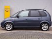 Opel Meriva - 1.6-16V Cosmo Automaat Navigatie / Unieke kilometerstand / Parkeersensoren / Half Leer - 1 - Thumbnail