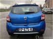 Dacia Sandero - stepway 0.9 tce 90pk bi-fuel lpg/g3 onderbouw - navi - airco - 163, - wegenbelasting - 1 - Thumbnail