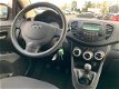 Hyundai i10 - 1.25i Dynamic Cool /5-DRS/AIRCO/NAP/NETTE STAAT - 1 - Thumbnail