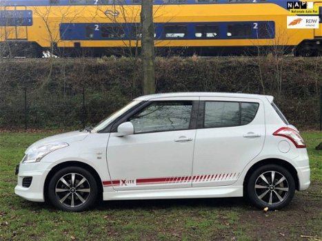 Suzuki Swift - 1.2 Exclusive airco velgen xite uitvoering zeer netjes - 1