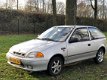 Suzuki Swift - 1.0 GLS airco nieuwe apk velgen zgan banden - 1 - Thumbnail