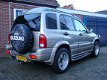 Suzuki Grand Vitara - 2.5 V6 APK/NAP/GRIJS KENTEKEN - 1 - Thumbnail