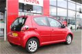 Toyota Aygo - 1.0-12V Aspiration Red Navigator | Navigatie | LM velgen - 1 - Thumbnail