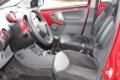 Toyota Aygo - 1.0-12V Aspiration Red Navigator | Navigatie | LM velgen - 1 - Thumbnail