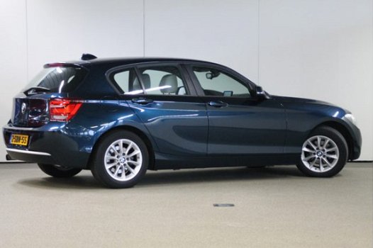 BMW 1-serie - 114i High Executive Urban Line / Leder / Navigatie Professional / Xenon / Stoelverwarm - 1