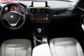 BMW 1-serie - 114i High Executive Urban Line / Leder / Navigatie Professional / Xenon / Stoelverwarm - 1 - Thumbnail