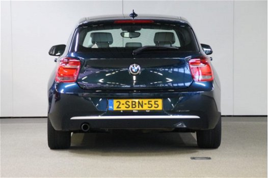 BMW 1-serie - 114i High Executive Urban Line / Leder / Navigatie Professional / Xenon / Stoelverwarm - 1