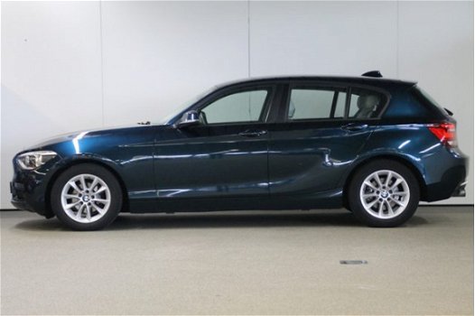 BMW 1-serie - 114i High Executive Urban Line / Leder / Navigatie Professional / Xenon / Stoelverwarm - 1