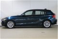 BMW 1-serie - 114i High Executive Urban Line / Leder / Navigatie Professional / Xenon / Stoelverwarm - 1 - Thumbnail