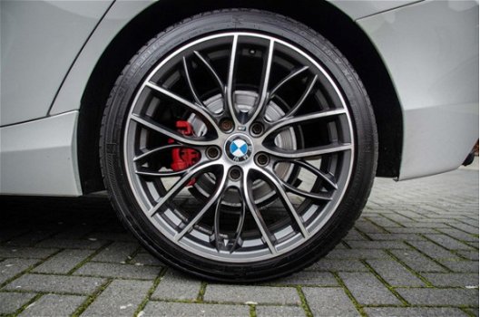 BMW 1-serie - 1-serie 116i 2012 wit performance leder 1 serie - 1