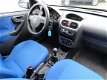 Opel Corsa - 1.4-16V Comfort - 1 - Thumbnail