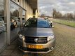 Dacia Logan MCV - 0.9 TCe Prestige AIRCO / ELEKTRISCHE RAMEN / NAVIGATIE / PARKEERSENSOR - 1 - Thumbnail