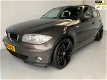 BMW 1-serie - 118i High Executive Leer PDC 19' Climate+Cruise control - 1 - Thumbnail