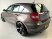 BMW 1-serie - 118i High Executive Leer PDC 19' Climate+Cruise control - 1 - Thumbnail