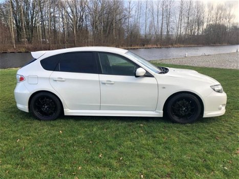 Subaru Impreza - 2.5 WRX Executive AWD canon van een auto - 1