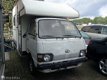 Toyota HiAce - 1.6 Benzine Kampeerwagen - 1 - Thumbnail