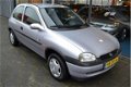 Opel Corsa - 1.2i-16V Strada | Stuurbekrachtiging | Radio/CD | 68.658 km | - 1 - Thumbnail