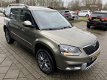 Skoda Yeti Outdoor - 1.2 TSI Adventure Navigatie, Cruise Control, PDC, Climate, 17-LM - 1 - Thumbnail