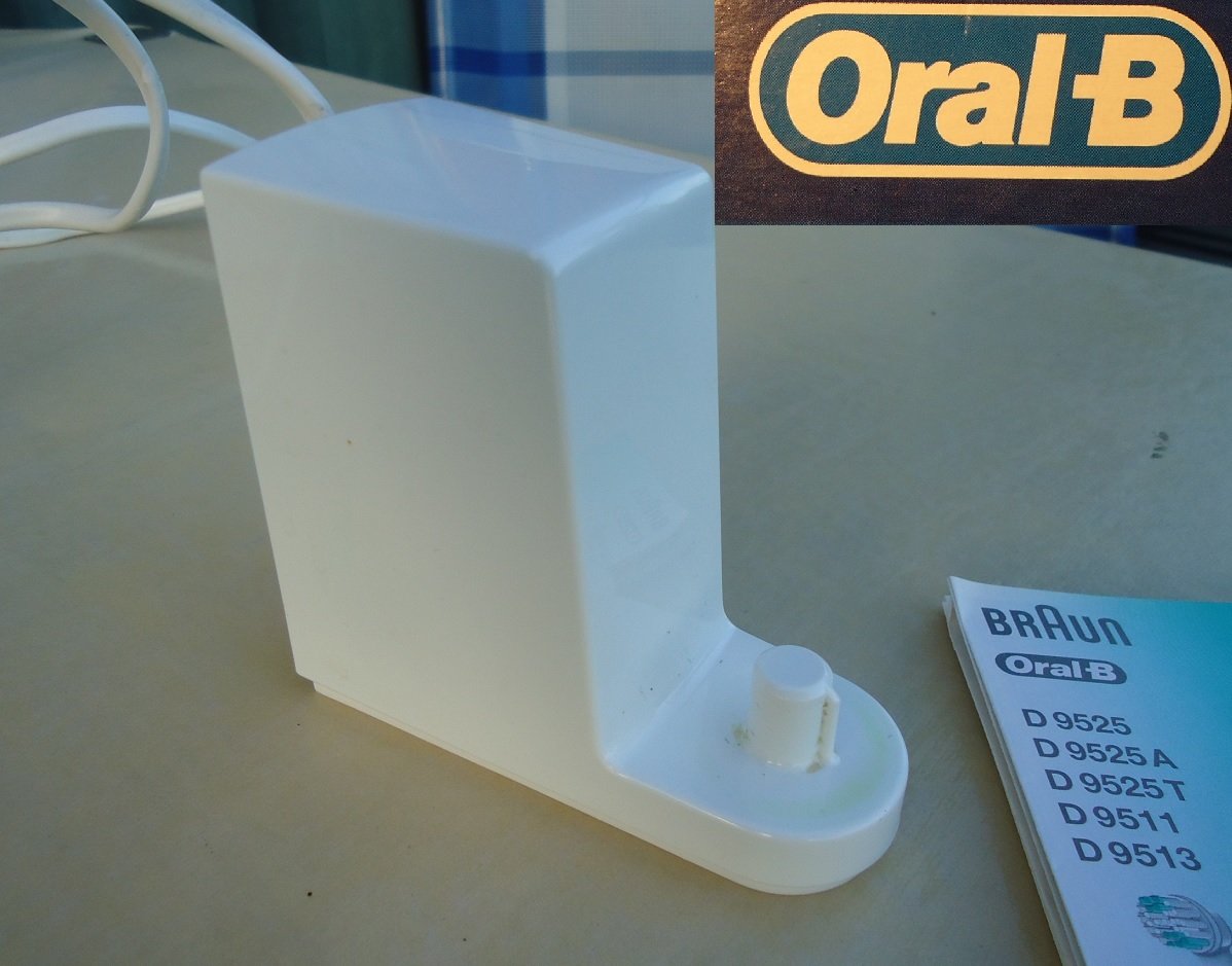 Een oplader voor een elektrische tandenborstel van Oral-B. - Afbeelding 2