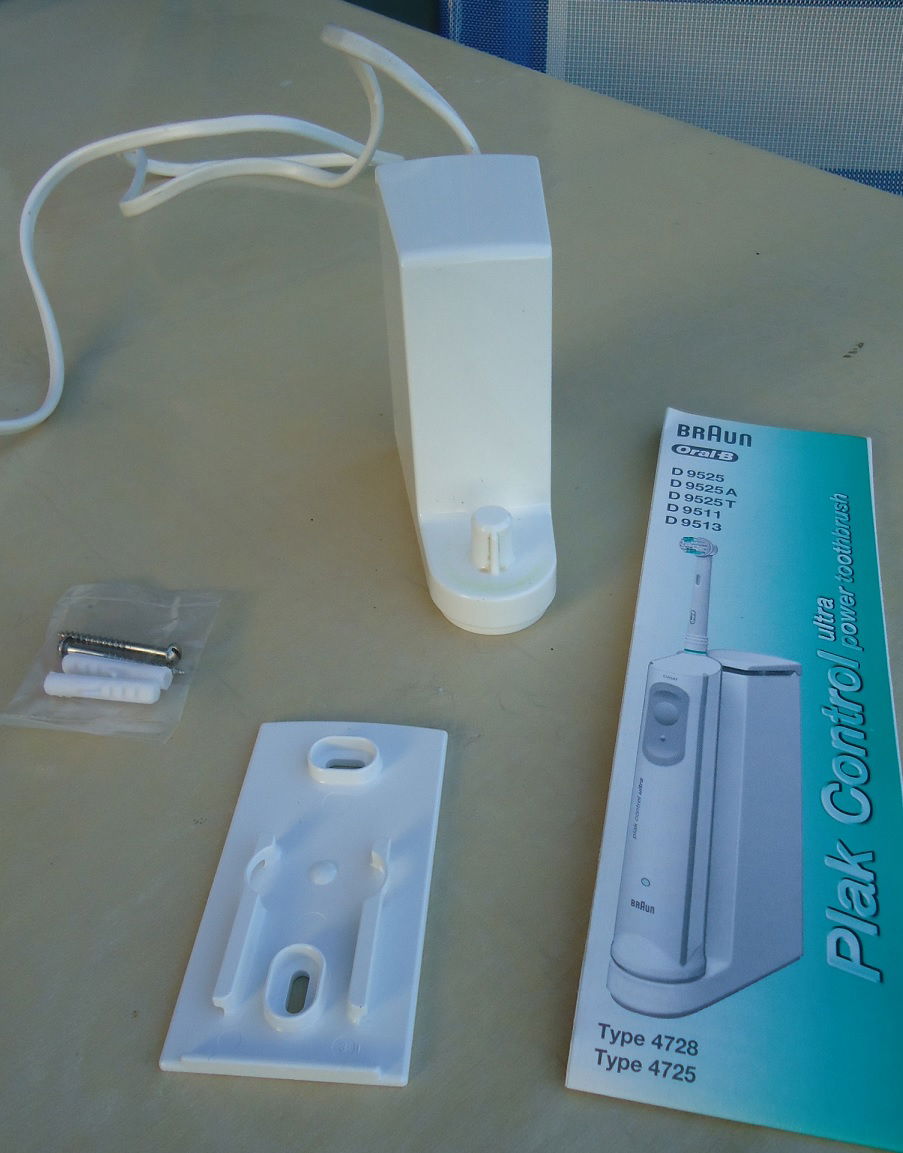 Een oplader voor een elektrische tandenborstel van Oral-B. - Afbeelding 5