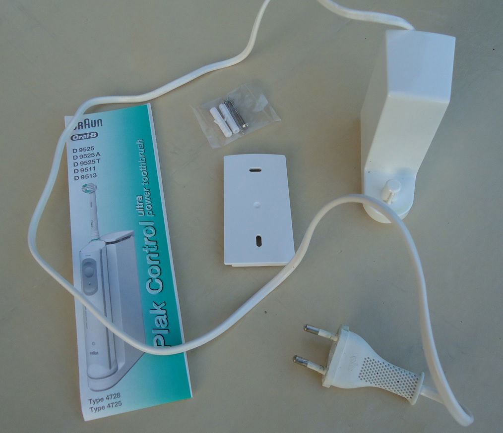 Een oplader voor een elektrische tandenborstel van Oral-B. - Afbeelding 7