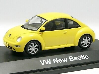 1:43 Schuco 04532 Volkswagen New Beetle 1997-2005 geel - 0
