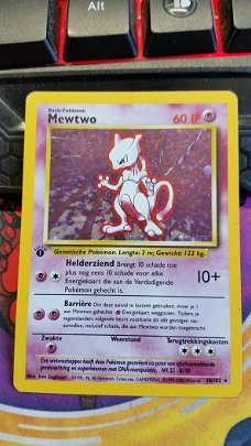 Mewtwo  10/102  Holo 1st Edition Base Set 1st Edition  IP GEBRUIKT