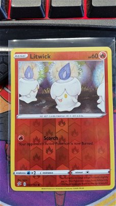 Litwick  031/192  Common  (reverse) Sword & Shield: Rebel Clash