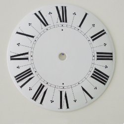 Faïence wijzerplaat. Diameter 21,5 cm