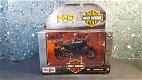 Harley Davidson 2011 XR 1200X mat zwart 1:18 Maisto - 3 - Thumbnail