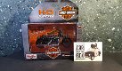 Harley Davidson 2014 Sportster Iron 883 oranje 1:18 Maisto - 6 - Thumbnail