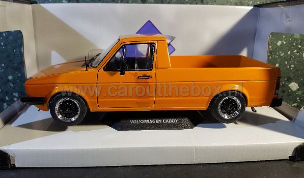 Volkswagen Caddy pick-up oranje 1:18 Solido - 0