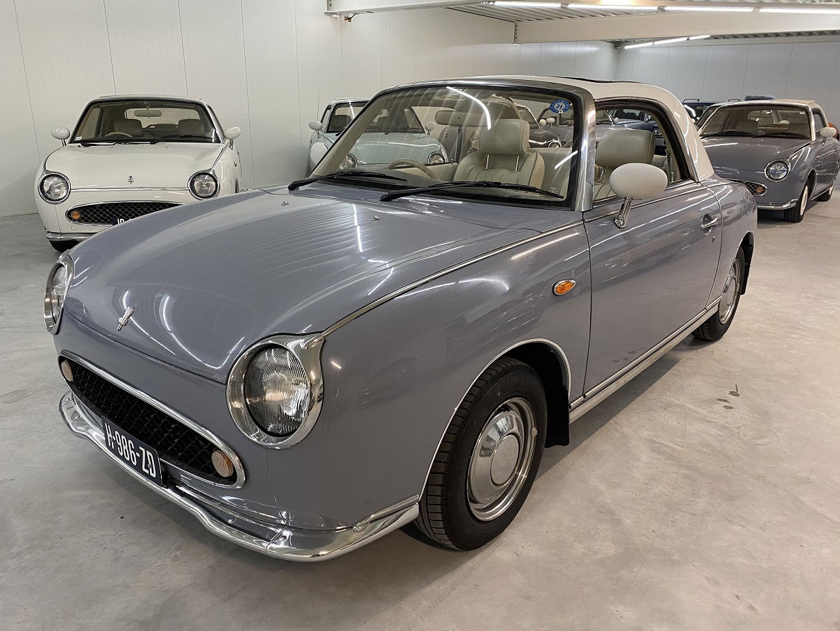 Unieke Nissan Figaro met slechts 42000km van 1e eigenaar - Afbeelding 2