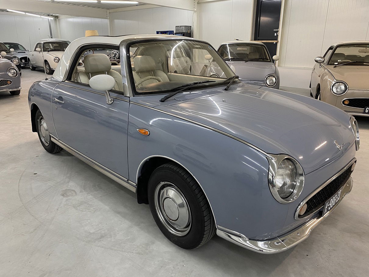 Unieke Nissan Figaro met slechts 42000km van 1e eigenaar - Afbeelding 5