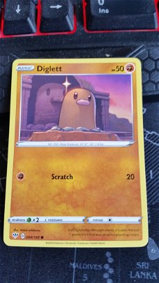  Diglett  084/189  Common Sword & Shield: Darkness Ablaze