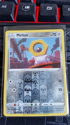 Meltan  129/189  (reverse) Common Sword & Shield: Darkness Ablaze