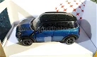 Mini Cooper S Countryman R60 blauw 1:24 Rastar - 1 - Thumbnail
