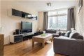 Centraal gelegen en licht 2-kamer appartement - 6 - Thumbnail