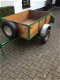 Aanhangwagen met reservewiel is afsluitbaar, de bak maat 150x100x40 - 1 - Thumbnail