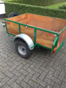 Aanhangwagen met reservewiel is afsluitbaar, de bak maat 150x100x40 - 2