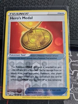 Hero's Medal 152/185 (reverse) Uncommon Sword & Shield: Vivid Voltage - 0