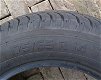 4x winterbanden + velg 14 inch 4x100 54.1 ET 38 suzuki Alto Uniroyal - 1 - Thumbnail