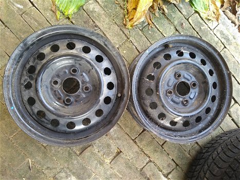 4x winterbanden + velg 14 inch 4x100 54.1 ET 38 suzuki Alto Uniroyal - 4