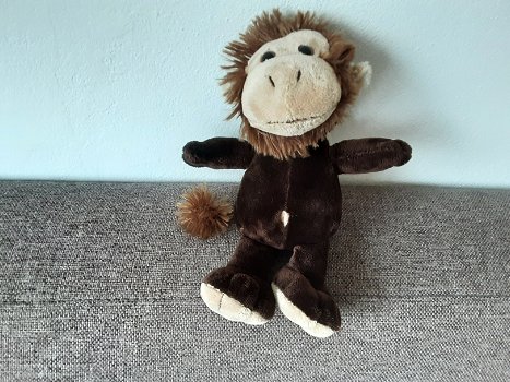 1200 Aap knuffel Donkerbruin zittend koordje als staart 15cm - 0