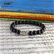Tibetaanse armband van zwarte Onyx met gebedsmolen - 2 - Thumbnail